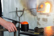© robertharding - Manufacturing of handcrafted glassblowed Christmas baubles, International Centre of Glassworks Art, Meisenthal, Moselle department, Lorraine region, France, Europe
