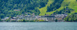 © robertharding - View of Zell am See from tour boat on Lake Zell on a sunny day, Zell am See, Salzburg, Austria, Europe