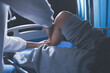 © Sutthicha - Rehabilitation therapy Professional male physiotherapists working in rehabilitation centers while treating male patients with leg and muscle pain.