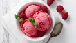 © Ruhi - Raspberry ice cream in white bowl overhead shot