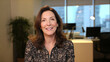 © A2Z AI  - Confident Woman Smiling in a Modern Office Setting: Professionalism, Success, and Leadership in Business, Ready for Presentation or Corporate Communication