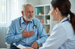 © miss irine - Senior man shows chest pain to female doctor during appointment. He feels discomfort and has a bad pain. Doctor listens to patient in clinic, medical examination.