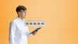 © ImageFlow - Side view of man holding tablet with floating five-star rating bubble in 2d style on orange background, concept of customer feedback excellence