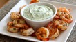 © Soba - Grilled shrimp with creamy herb dip on white plate