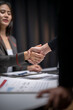 © Apichat - Businesswomen shaking hands after successful agreement in office