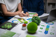 © Apichat - Business people planning esg sustainability green strategy