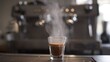 © Bocchi - crema. Close-up of steaming espresso flow, rich brown liquid with creamy texture, warm ambiance of a cozy cafe setting. bar promotions.