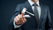 © SHORIFULDESIGNS - Businessman holding a gavel in his hand for justice and law