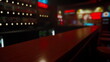 © icetray - Colorful lights create an energetic atmosphere in a bustling bar during the evening. Patrons enjoy drinks while chatting and laughing, filling the space with excitement and warmth.