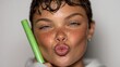 © Karen Vardanian - Kiss, makeup with closeup of woman for glow, self care and cosmetics. green ink Shine, beauty salon and glamour with pout lips of person for aesthetic, mouth and cosmetology treatment. High quality ph