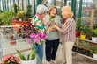 © ADDICTIVE STOCK - Senior women enjoy shopping day with decorative owl