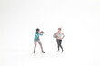 © yl - Miniature photographer captures confident model in studio scene