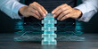© saichon - Person stacking transparent blocks with digital circuit lines in background, symbolizing technology and strategy development