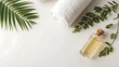 © Kanika Graphic - Calm Spa Essentials with Towel, Bottle, and Green Leaves Arrangement
