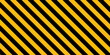 © Dunzz - Diagonal yellow and black hazard warning stripes pattern. Industrial safety background with caution lines for construction, danger zones, and security notice.