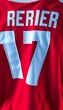 © Patcharee - Vibrant red team jersey with white numbers and trim, modern, jersey style