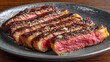 © Plaifah - Juicy Grilled Steak on Black Plate with Perfectly Cooked Medium Pink Center and Crispy Outer Layer, Ideal for Food Photography and Culinary Arts