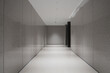 © zhu difeng - Modern minimalist gray stone corridor with empty interior space and clean architectural lines