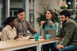© Zamrznuti tonovi - Diverse business team collaborating during an office meeting