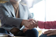 © opolja - Business people, handshake and welcome for meeting, partnership deal and employee collaboration