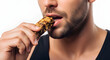 © Yasabosant - Fit man about to bite protein bar, fitness and performance nutrition concept, dynamic close-up.