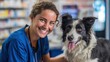 © awais - Smiling vet in blue uniform checking a dog during a routine pet health inspection
