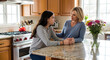 © BornHappy - Supportive woman holding hands with her teen daughter on a kitchen counter