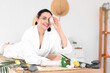 © Pixel-Shot - Young woman with Easter egg lying in spa salon