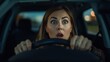© LimeSky - A woman driver appearing startled behind the wheel