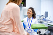 © Graphicroyalty - Gynecologist consultation and checkup. Female doctor talking to patient, Healthcare and Medicine concept. Attractive woman doctor in white coat smiling and consulting patient in medical clinic.