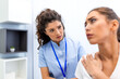 © Graphicroyalty - Pain in the shoulder. Upper arm pain, People with body-muscles problem, Healthcare And Medicine concept. Attractive woman holding painful shoulder while consulting concerned doctor at clinic.