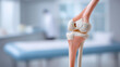 © Denis Yevtekhov - Closeup of knee joint model on doctor table in orthopedics center, anatomical teaching tool, joint structure display, medical education model, with copy space