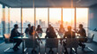 © Rahman - Business meeting in modern office with city skyline at sunset