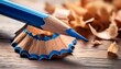 © Karen - macro photo of a sharpened blue pencil tip and wood shavings