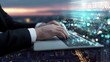 © Yusuf - Businessman Typing on Laptop with Digital Data Overlaying Cityscape at Dusk.