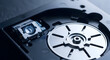 © justsann - Close-up of a CD DVD drive laser head and spindle mechanism.