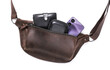 © splitov27 - Leather belt bags with purse, smartphone on a white background