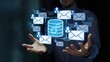 © MediaStockPro - Businessman managing email marketing system with digital database interface and customer communication network,concept of CRM automation,data integration and cloud messaging technology