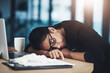 © BuyoutReese09/peopleimages.com - Tired, woman and sleeping at laptop in office for low energy, flu fatigue or overworked on deadline. Tech, exhausted person or nap at desk for illness burnout, insomnia or rest from workload pressure