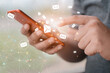 © Dinamartina93 - Man using smartphone with inbox e-mail icon.