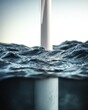 © Red - A partial view of a marine structure extending both above and below the undulating water's surface