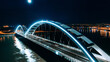 © AmazingAerialAgency - Aerial view of illuminated bridge arches mirroring in the dark water, a modern marvel under the moon's glow, Novi Sad, Vojvodina, Serbia.
