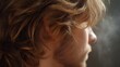 © Thares2020 - Close up profile of a person s auburn hair and ear with subtle mist and soft natural light