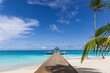 © icemanphotos - Maldives water bungalow luxury resort pier summer travel background sunny sky, blue ocean tropical island paradise overwater villa jetty exotic, honeymoon destination serene nature scenery sea