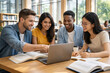 © thodonal - Group of young friends studying together in a library setting