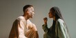 © Andrii Zastrozhnov - Caucasian male and african female young adults engaging in intense conversation