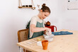 © Tania Cervian/Stocksy - Young woman working with porcelain clay at home