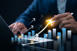 © IDOL'foto - business investment strategy and economic success, businessman analyzing financial growth chart on laptop with rising arrow graph show investment success, profit increase and strategic planning