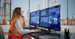 © Andrey Popov - Female Engineer Checking Efficiency On Multiple Screens