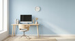© Sanoor - Modern home office with computer and minimalist decor on light blue wall background